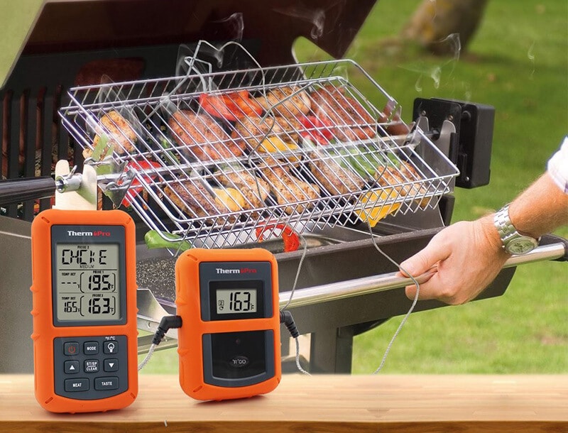 smoke grilling with food thermometer